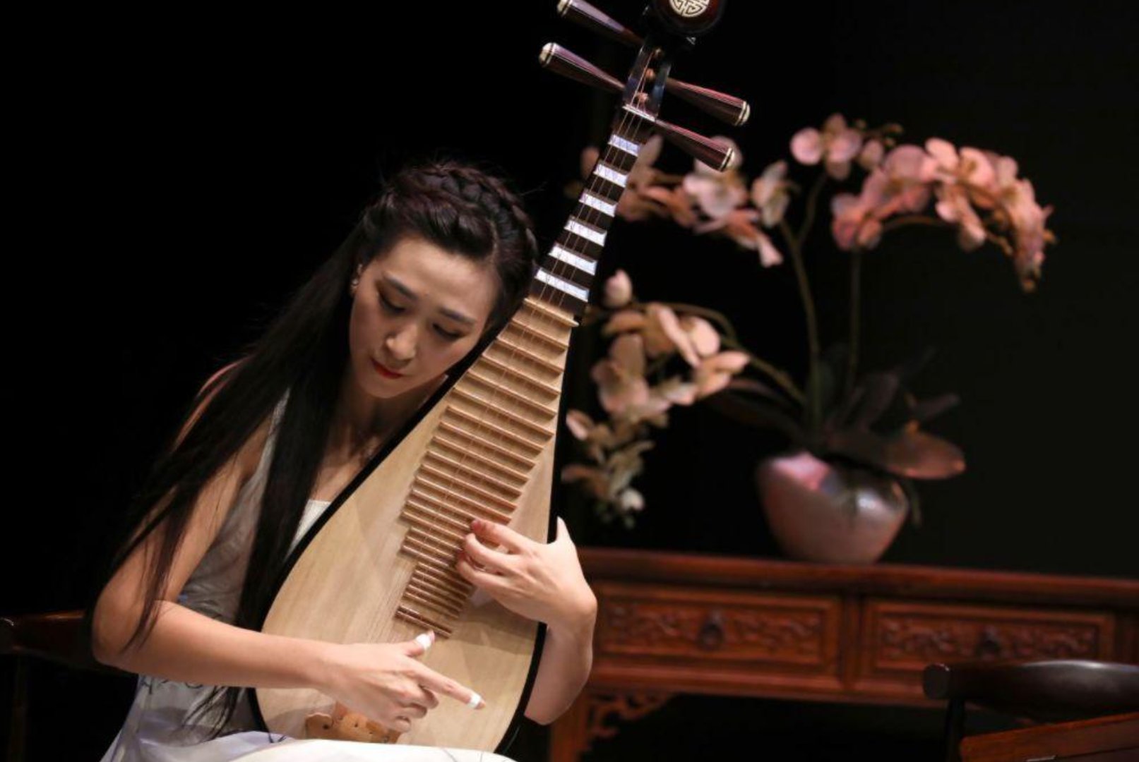 中国乐器按照什么分为吹拉弹打？