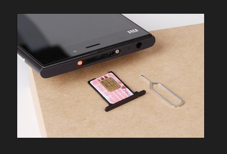 小米3手机手机卡插哪，小米3后盖打不开的啊？