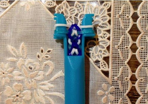 橡皮筋手链怎样打结才不会松