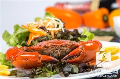 螃蟹柿子可以一起吃吗?